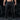 Goblin Gear Acid Wash Sweat Pants – person wearing dark gray sweatpants with a logo in a gym setting